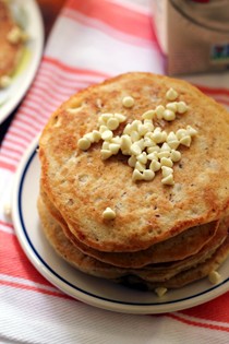 White chocolate macadamia nut pancakes with coconut-maple syrup