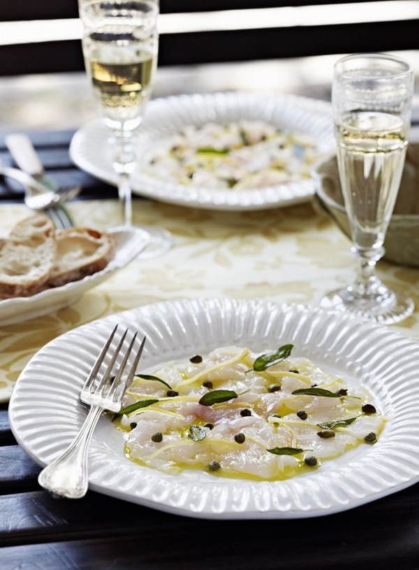 White fish carpaccio with fried sage, capers and preserved lemon
