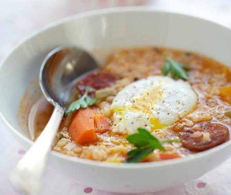 White lentil soup with chorizo, poached eggs, and paprika cream