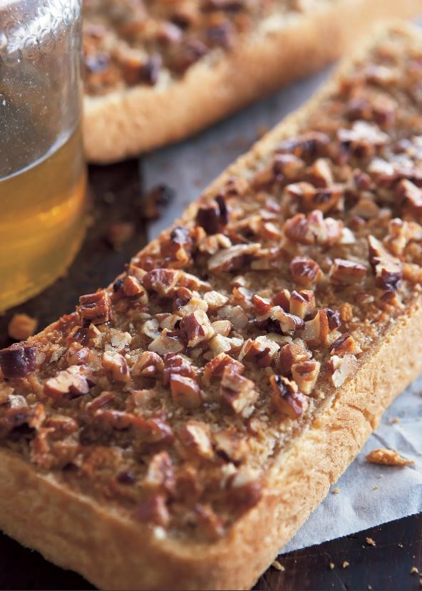 White loaf with honey / maple syrup, butter, and pecans