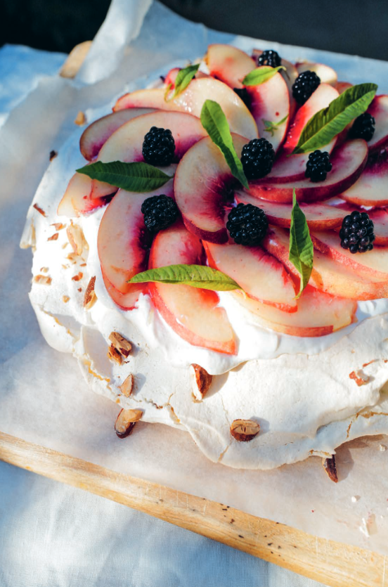 White peach, blackberry and roasted almond Pavlova