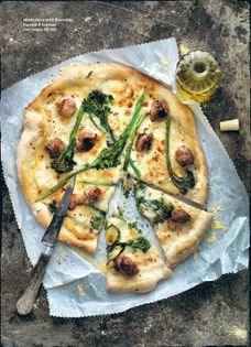 White pizza with broccolini, fontina & sausage