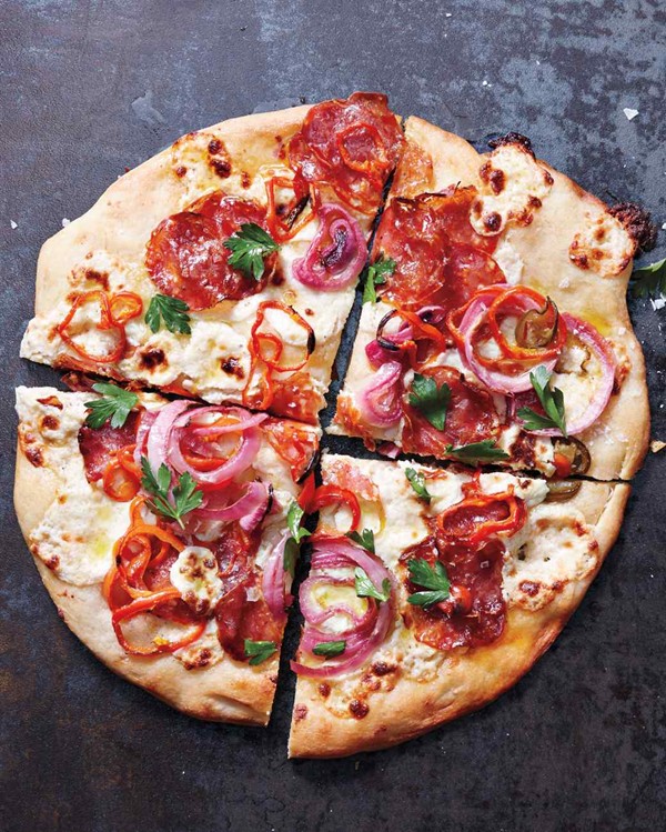 White pizza with pickled onions and peppers
