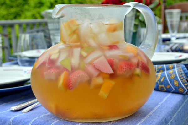 White sangria with apples, oranges, and strawberries