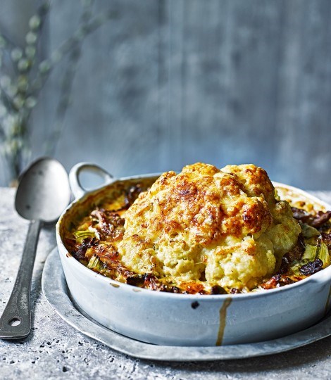 Whole baked cauliflower with pearl barley, wild mushrooms and cheese