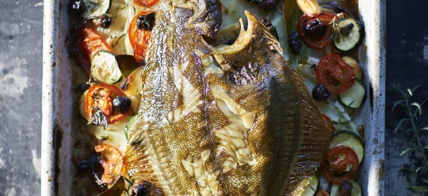 Whole baked fish with tomatoes, potatoes, and olives (Poisson au four façon Pauline)
