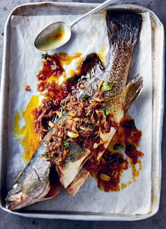 Whole baked fish with vadouvan butter