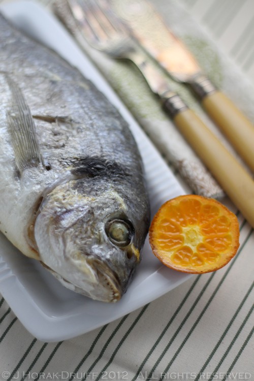 Whole baked gilt-head bream with Clemengold clementines and thyme butter