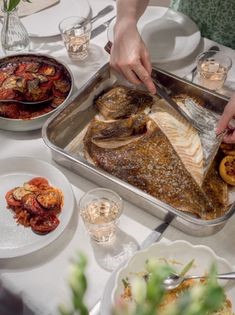 Whole baked turbot with braised squid ratatouille