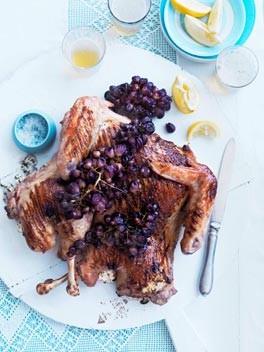 Whole barbecued turkey with buffalo ricotta and blistered grapes