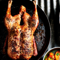 Whole crispy duck with spiced clementines