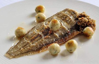 Whole Dover sole with a tarragon and lemon stuffing and potato dumplings