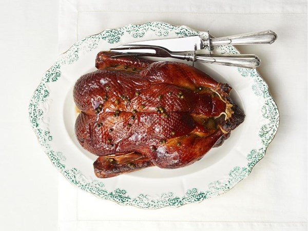 Whole duck with green peppercorn glaze 