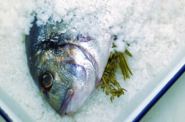 Whole fish baked in a salt crust