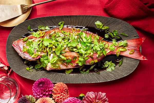 Whole fish drizzled with hot ginger-scallion oil