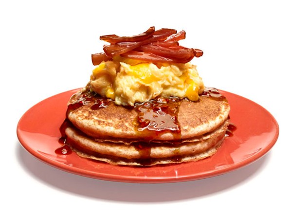 Whole-grain pancakes with eggs and bacon