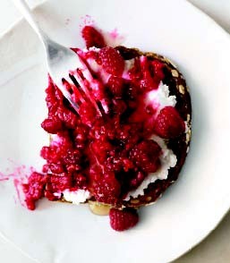 Whole-grain toast with goat cheese and raspberries