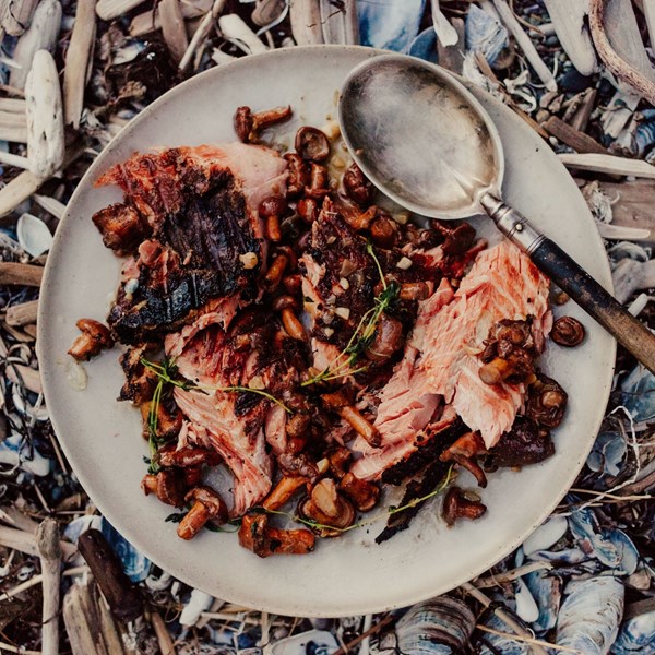 Whole grilled salmon with chanterelles