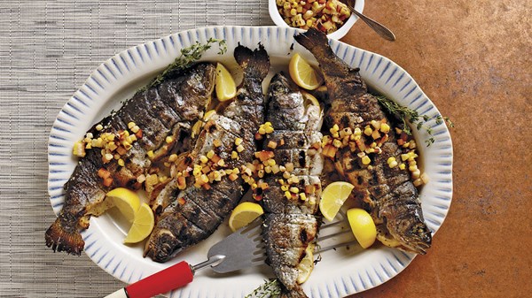 Whole grilled trout with charred corn and black-plum chowchow