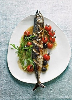Whole mackerel roasted with cherry tomatoes and olives
