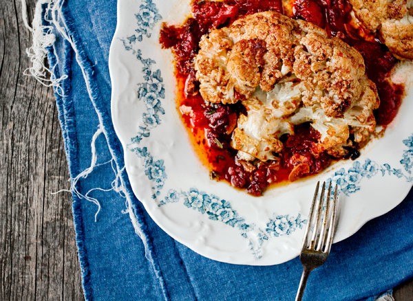 Whole pot-roasted cauliflower with tomatoes and anchovies