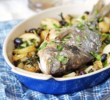 Whole roast bream with potatoes and olives
