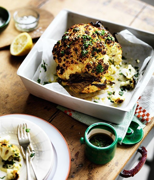 Whole roast cauliflower with parsley and anchovy sauce
