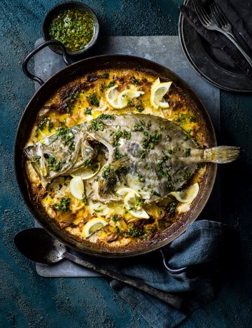 Whole roast John Dory with potato and fennel Dauphinoise and salsa verde