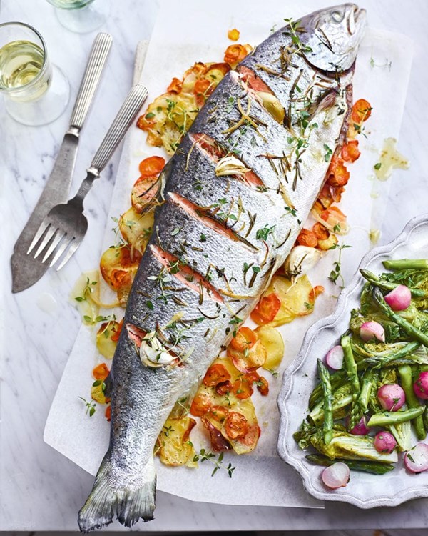 Whole roast salmon with braised lettuce and spring vegetables 