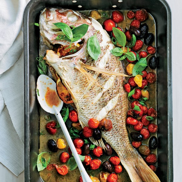 Whole roast snapper with heirloom tomatoes & olives [John Besh]