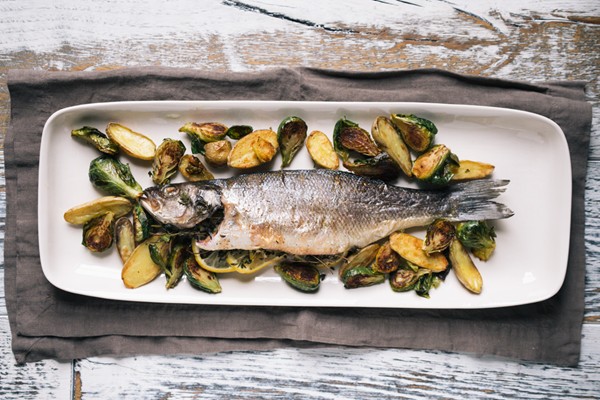 Whole-roasted branzini with Brussels sprouts and fingerlings