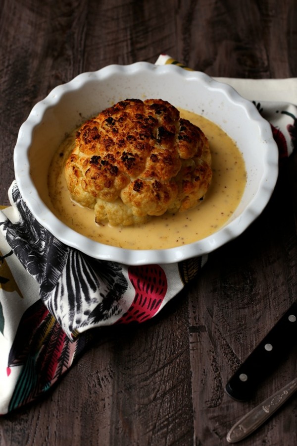 Whole roasted cauliflower with cheddar beer sauce