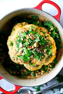 Whole roasted cauliflower with hazelnut, orange, and saffron