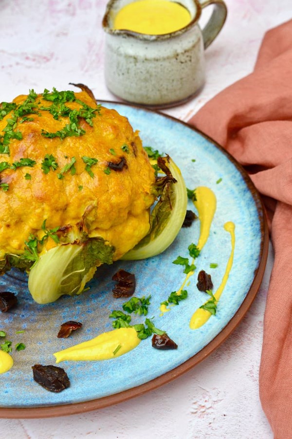 Whole roasted cauliflower with tahini sauce