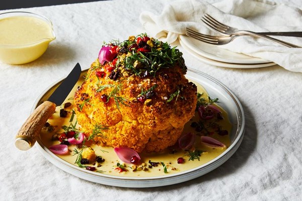 Whole roasted cauliflower with turmeric-tahini sauce & pistachios
