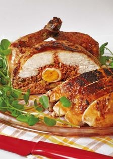 Whole roasted chicken stuffed with embutido (Chicken relleno)