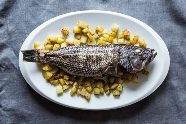 Whole roasted fish with rosemary potatoes