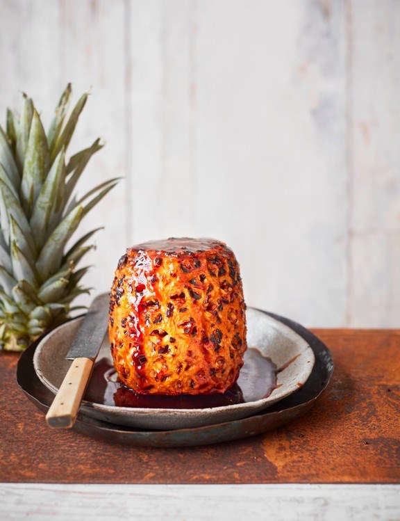 Whole roasted pineapple in spiced caramel