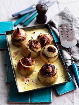 Whole roasted stuffed onions with cream, Parmesan and mushrooms