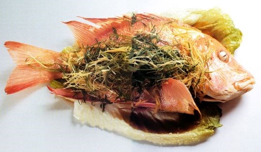 Whole steamed fish with ginger and spring onions