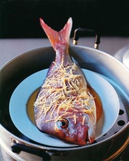 Whole steamed fish with ginger and shallots