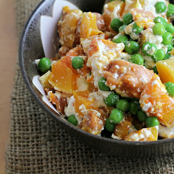 Whole wheat carrot gnocchi with peas, butternut squash, and ricotta