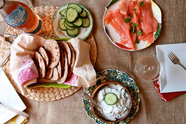 Whole wheat flat bread with herb yogurt cucumber dip