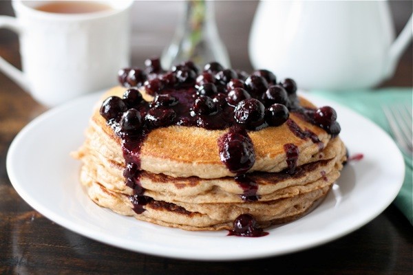 Whole wheat kefir pancakes with blueberry sauce