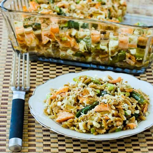 Whole wheat orzo casserole with salmon, asparagus, and feta