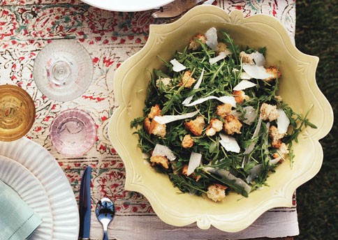 Wild arugula salad with garlic croutons, shaved Parmesan, and lemon
