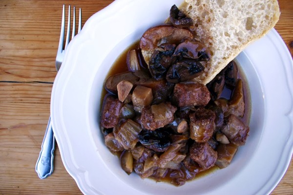 Wild boar sausage and caramelised apple stew