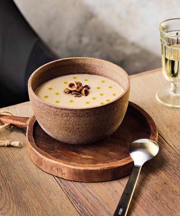 Wild mushroom & celeriac veloute with hazelnuts & truffle oil 