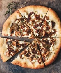 Wild mushroom, caramelized onion, and goat cheese pizza