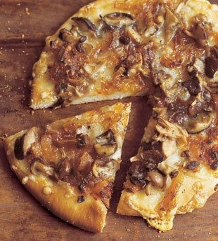 Wild mushroom pizza with caramelized onions, Fontina, and rosemary 